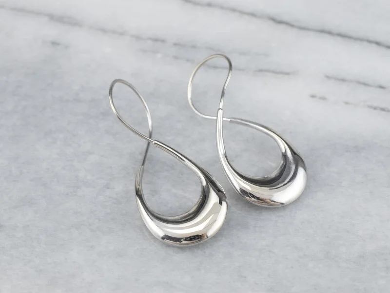 Hoop earrings with a matte black finish for a sleek, edgy vibe-Modernist Twisted White Gold Hoop Earrings