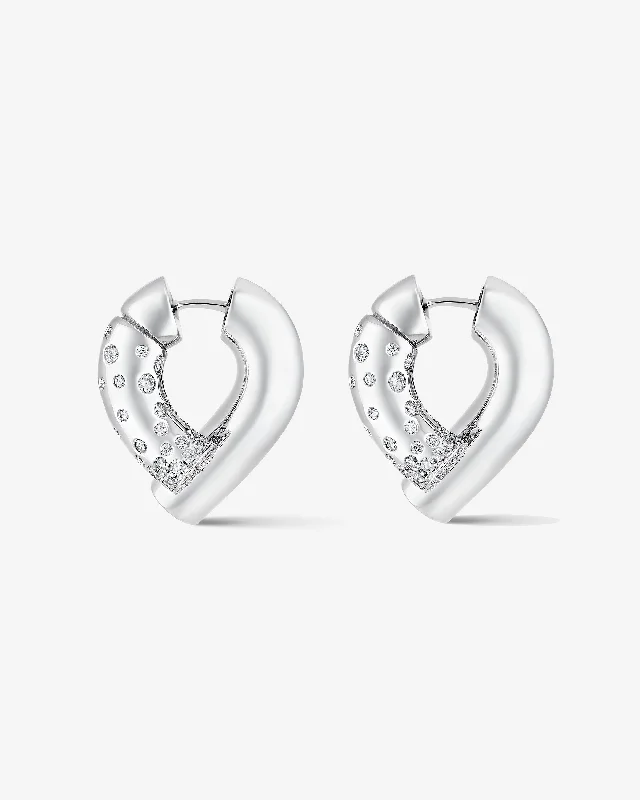 Hoop earrings with twisted metal designs for a dynamic and modern style-Oera earrings