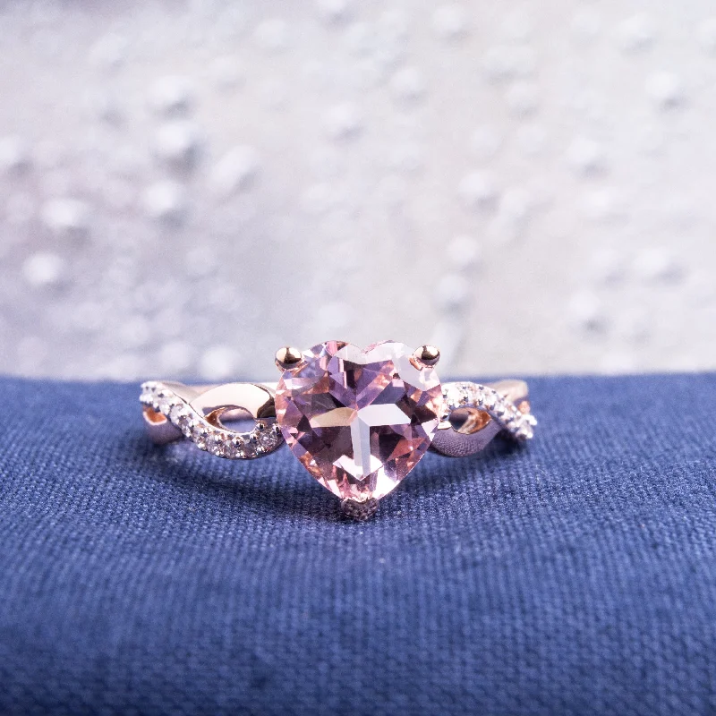 Rings with raw topaz for icy charm -Miadora 10k Rose Gold Heart Shaped Morganite and 1/10ct TDW Diamond Twist Ring (G-H, I2-I3) - Pink