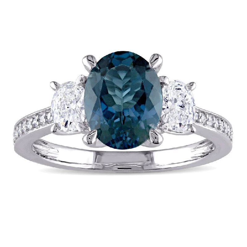 Rings with vintage-inspired emerald for luxury -Miadora Signature Collection 14k White Gold London Blue Topaz 5/8ct TDW Oval and Round Diamond Engagement Ring (G-H, I1-I2)