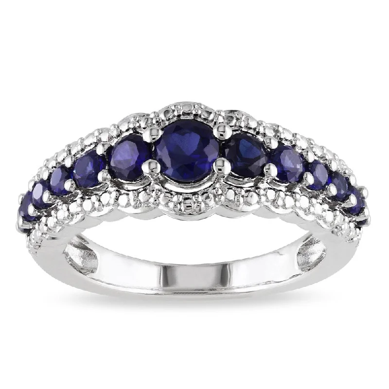 Rings with tourmaline gems for bold hues -Miadora Sterling Silver Created Blue Sapphire Anniversary Band