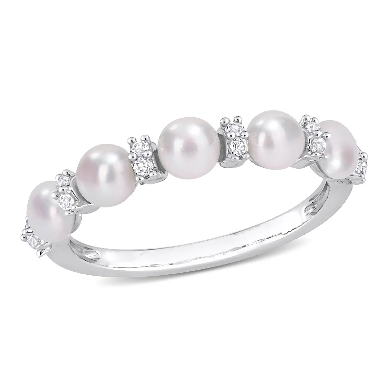 Rings with delicate filigree sapphire settings -Mimi & Max 3.5-4mm Cultured Freshwater Pearl and 1/8ct TGW White Topaz Semi Eternity Ring in Sterling Silver