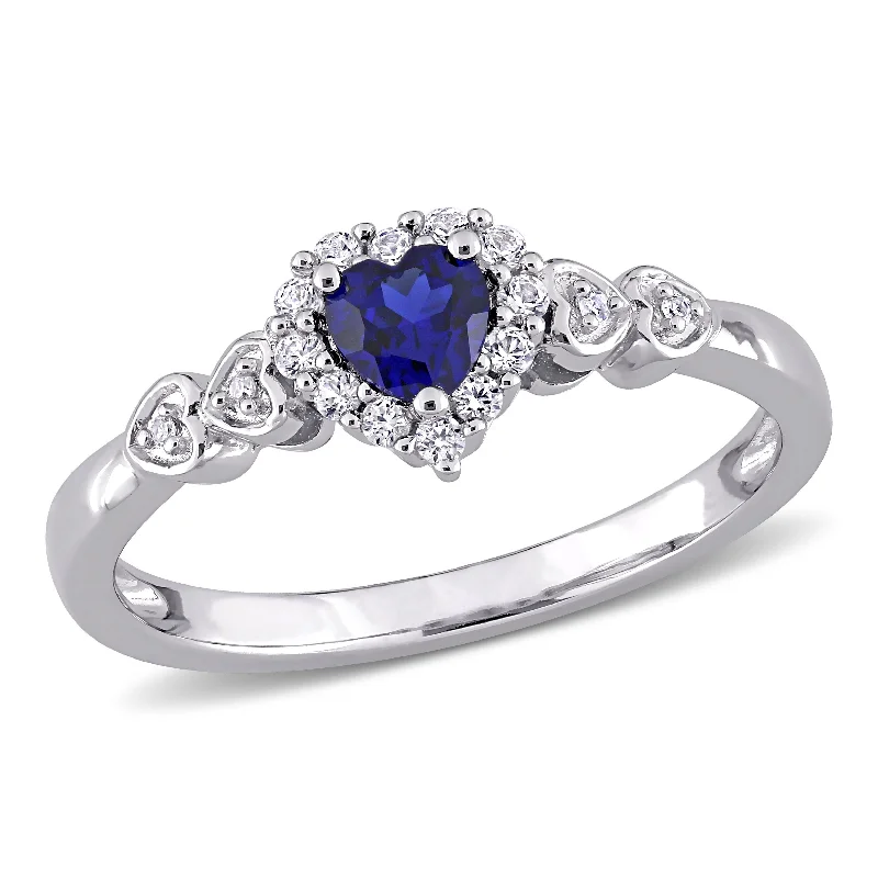 Rings with knot motifs for symbolic love -Mimi & Max 3/8ct TGW Created Blue Sapphire White Sapphire and Diamond Accent Heart Ring in Sterling Silver