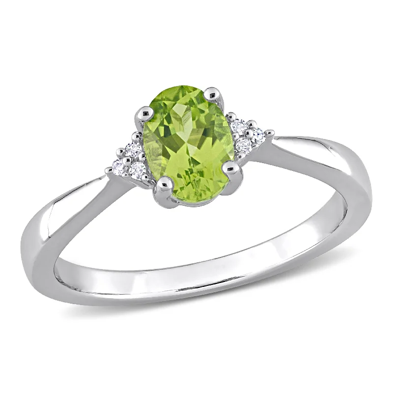 Platinum rings with sparkling sapphire center stones -Mimi & Max 4/5ct TGW Oval-Cut Peridot and Diamond Accent Ring in Sterling Silver